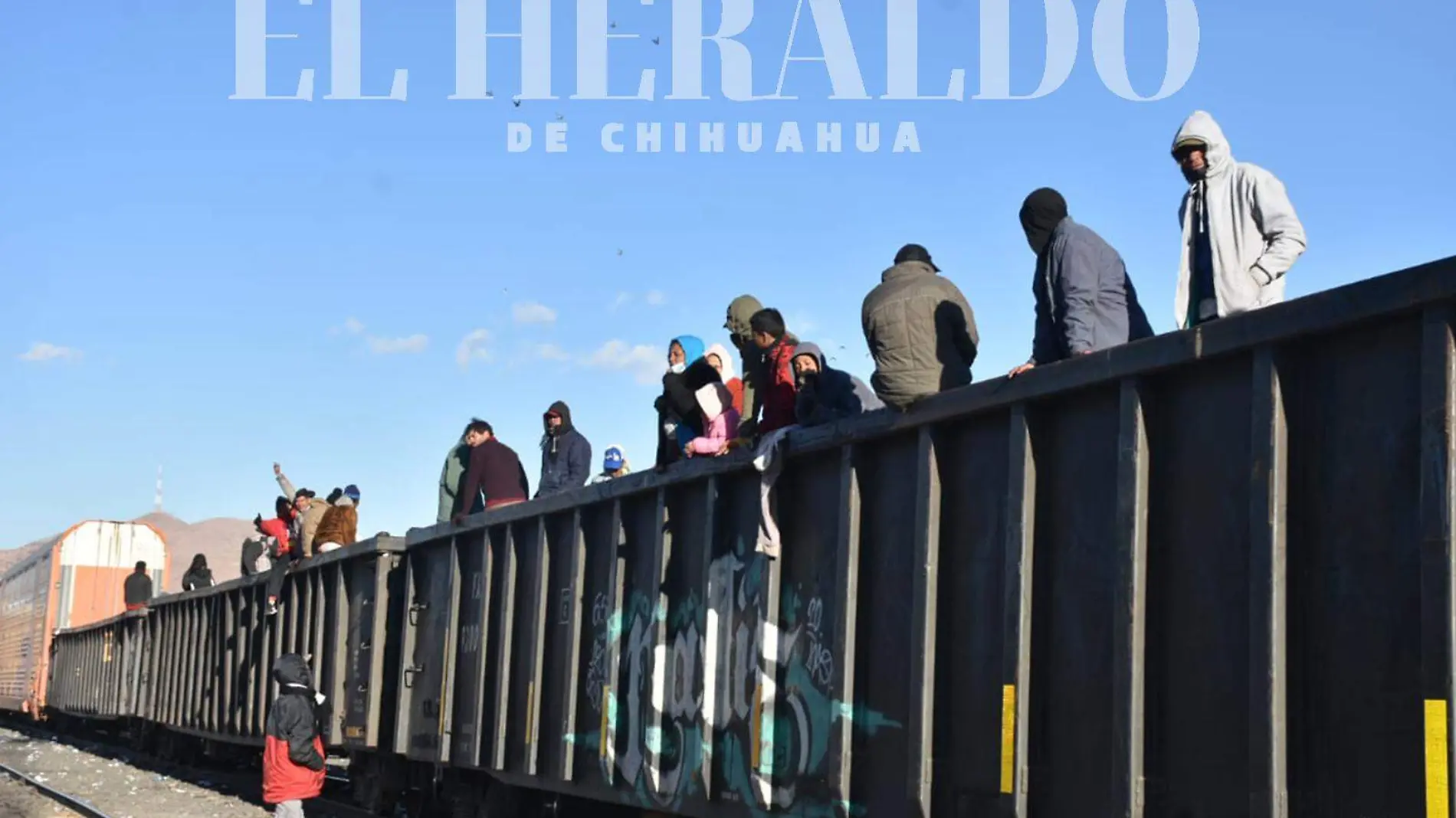 migrantes sobre tren